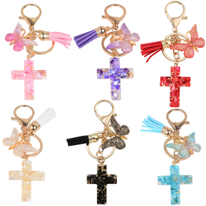 Vente en gros personnalisé mini <span class=keywords><strong>porte</strong></span>-clés religieux jésus chrétien en plastique résine <span class=keywords><strong>macramé</strong></span> croix papillon gland nouveau <span class=keywords><strong>porte</strong></span>-clés - Product Image 4