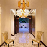 Lustre moderne en cristal et acier inoxydable doré de luxe avec télécommande, idéal pour les halls d'hôtel et les villas, avec LED en verre