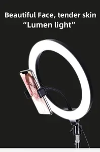 La luce ad anello da 10 pollici con illuminazione fotografica a 10W e la temperatura 1.1 per il trucco in Live Streaming include il treppiede