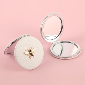 Miroir de poche rond en similicuir blanc cassé avec logo personnalisé, décor abeille 3D en métal, miroir de maquillage HD pliable double face pour la vente en gros - Product Image 1