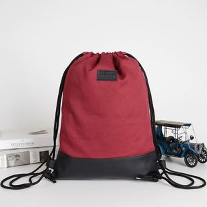 Sac à cordon en toile de coton durable avec base en PU robuste pour usage quotidien, décontracté pour les trajets et le shopping, avec patch de marque vintage - Product Image 2