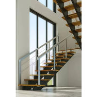 Escalier droit Prima Mono Stringer moderne à poutre simple en acier avec rampe en verre sans cadre pour villa