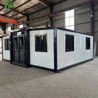 Maison conteneur préfabriquée pliable et extensible avec panneaux sandwich et structure en acier pour usage résidentiel (villa)