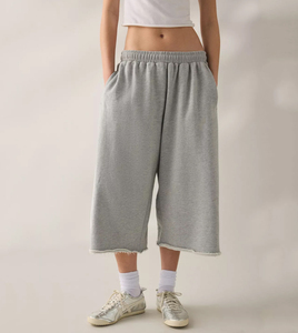 Culotte <span class=keywords><strong>de</strong></span> jogging capri pour <span class=keywords><strong>femme</strong></span> en molleton bouclé <span class=keywords><strong>de</strong></span> coton chiné, taille haute, style sarouel, avec taille élastique côtelée et bandes latérales blanches - Product Image 1