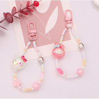 Nouveau porte-clés pendentif poupée mignonne perlée colorée en alliage et PU, accessoire de décoration pour étui d'écouteurs pour couples