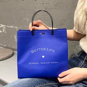 กระเป๋าถือกระดาษเป็นมิตรต่อสิ่งแวดล้อมพร้อมสีและโลโก้ที่กำหนดเองสำหรับบรรจุภัณฑ์เสื้อผ้าและใช้เป็นของขวัญ - Product Image 1