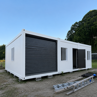 Maison conteneur préfabriquée modulaire en panneaux d'acier à assembler, pack plat 20FT, unités connectées, atelier à volets roulants, garantie 5 ans