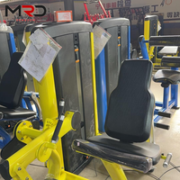 Machine d'exercice réglable pour l'étirement des cuisses et l'extension des jambes, pour la musculation, avec structure en acier