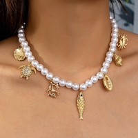 Colliers de style bohème pour femme, idéal pour l'été et la plage, avec étoiles de mer, coquillages, breloques thème vie marine, perles artificielles et corail, style bouddhiste