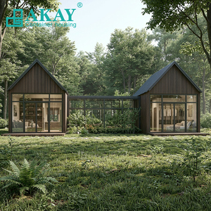 Maisons préfabriquées modernes de luxe en conteneurs, fabriquées en Chine, avec grandes fenêtres et terrasse ouverte, pour projets de villas de villégiature haut de gamme et d'hébergements touristiques. - Product Image 2
