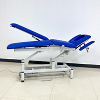 Table de massage électrique réglable moderne de lit de massage de station thermale de salon d'usine avec le prix bon marché