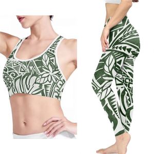 Venta al por mayor Sujetador deportivo de 2 piezas y mallas Conjuntos de fitness sin costuras Flores verdes Diseño polinesio Ropa deportiva personalizada Ropa deportiva - Product Image 1