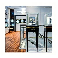 Petit magasin de bijoux de style européen simple, boutique complète, partenaire Fortune 500, design personnalisé, armoires en verre blanc, étagères murales