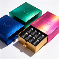 Maßgefertigte Luxus Schwarz-Gold Stempelprägung Fläschchen-Verpackungsbox Umweltfreundlich mit EVA-Auskleidung für 3ML 10ML Fläschchen