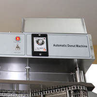 Gaz électrique entièrement automatique commercial grand T101 sans trou beignet Machine haute capacité beignet friteuse avec ce