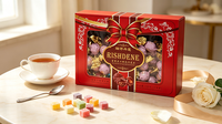 Élégante boîte cadeau en chocolat rouge à motif floral avec nœud, assortiment de gaufrettes fourrées au chocolat doré pour mariages et fêtes