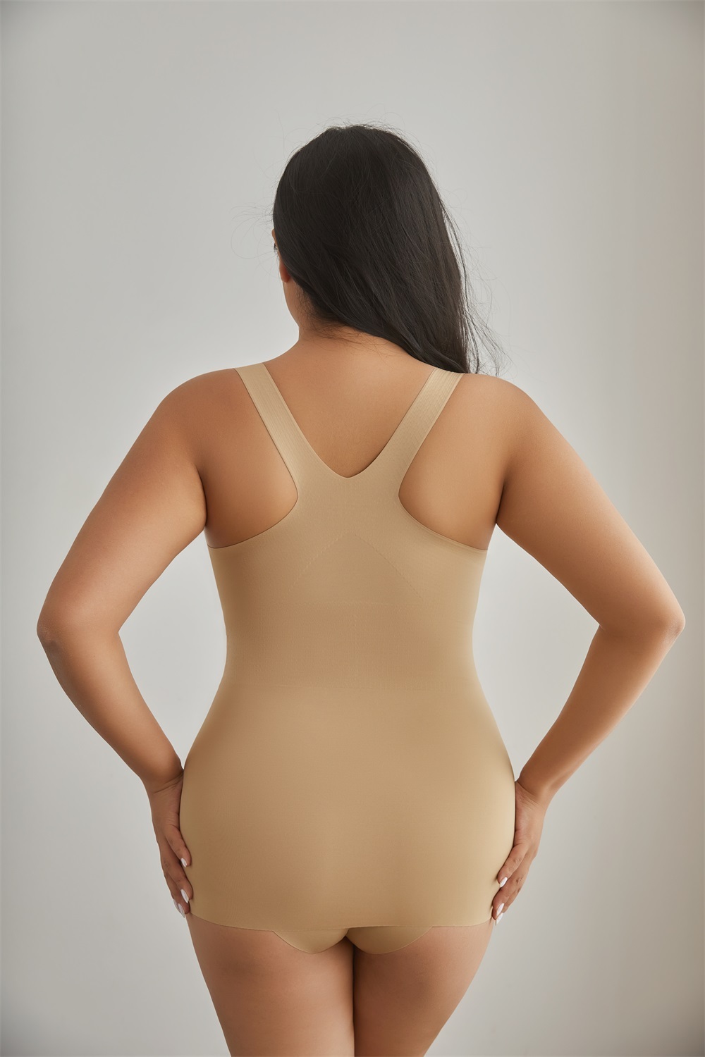 Tummy-Control Seamless Shapewear Bodysuit: back view showing seat coverage and shaping construction