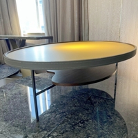 Table basse moderne et simple à deux niveaux, avec plateau supérieur en cuir et plateau inférieur en bois, table d'appoint ovale