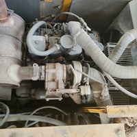 Excavatrice sur pneus Komatsu PW150-7 d'occasion, 15 tonnes, haute performance, engin de construction avec boîte de vitesses et pompe, prix avantageux