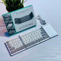Keyboard Lipat Nirkabel Portabel Mini BT Keyboard Ultra Tipis untuk Tablet dan Ponsel