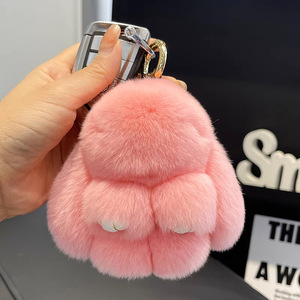 Llavero de conejo suave y esponjoso, lindo y colorido, de piel de conejo, con pompón, adorable, para mochila escolar, colgante de peluche genuino de conejo para bolso - Product Image 1