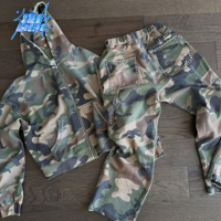 Ensemble de survêtement décontracté personnalisé pour l'automne, motif camouflage, avec fermeture éclair, coupe oversize, évasée et ample, effet délavé à l'acide, comprenant un pantalon de survêtement et un sweat à capuche