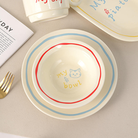 Service de table écologique en porcelaine fine, style coréen, peint à la main, motif chat mignon jaune clair, lignes contrastées rétro, pour fête, comprenant tasses et assiettes