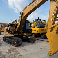 Excavatrice sur chenilles CAT 320D d'occasion, cabine fermée, chenilles en acier, flèche longue portée, machine de terrassement et de construction
