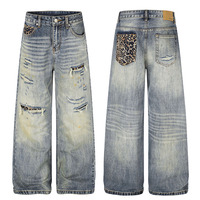 Celana Pria dan Wanita Gaya High Street Trendy Motif Leopard Patchwork Desain Distressed Jeans Streetwear Pria Model Longgar