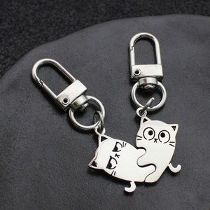 Factory New Cute Little Expression <b>Cat</b> Hugging Friend Couple Cartoon Gift Pendant Stainless Steel Keychain - Product Image 1