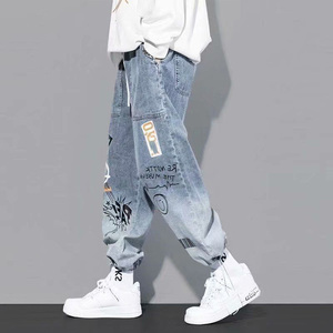 Frühling Herbst Saison Brief gedruckt Jeans Herren lose Cartoon Graffiti Leggings Hosen Trendy Draw string Denim Jeans - Product Image 3