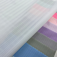 Tissu tricoté par polyester du textile 90% de trame de débardeur du football de nid d'abeilles de vêtements de sport pour la sublimation