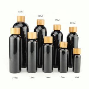 زجاجة بلاستيكية بغطاء من الخيزران 50: 60 من 50 من زجاجات مستحضرات التجميل السوداء فارغة - Product Image 1