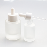 Bouteilles compte-gouttes plates en verre transparent dépoli, vides, de luxe, pour soins de la peau, huiles capillaires et huiles essentielles, 1oz 30ml 50ml, avec conception de couleur de logo personnalisée