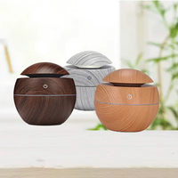 Diffuseur de vase à grain de bois blanc Mini humidificateur à brume fraîche à ultrasons Humidificateurs à grain de bois de forme ronde