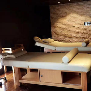 طاولة تدليك أيورفيدية يدوية حديثة من الخشب الصلب والجلد قابلة للطي مع إسفنج عالي الكثافة ومسند ظهر قابل للتعديل للسبا والفنادق - Product Image 6