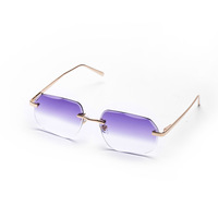 Lunettes de soleil rectangulaires UV400 2026 au design taillé diamant, légères, sans monture bleue, pour hommes et femmes