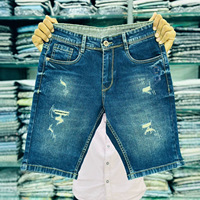 Shorts en jean déchirés pour hommes, taille mi-haute, coupe droite, en nylon/coton, délavage moyen, style décontracté d'été, vente en gros