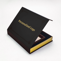 Boîte cadeau en carton noir en forme de livre avec fermeture magnétique personnalisée, avec insert en mousse