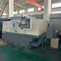Articles d'occasion de précision ultra-élevée, tour CNC Okuma L390E pour le tournage de pièces d'arbre de moyenne taille et de haute précision.