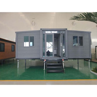 Maison modulaire temporaire extensible à double aile