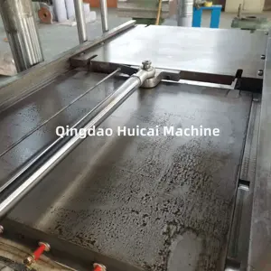 Machine automatique de vulcanisation en caoutchouc