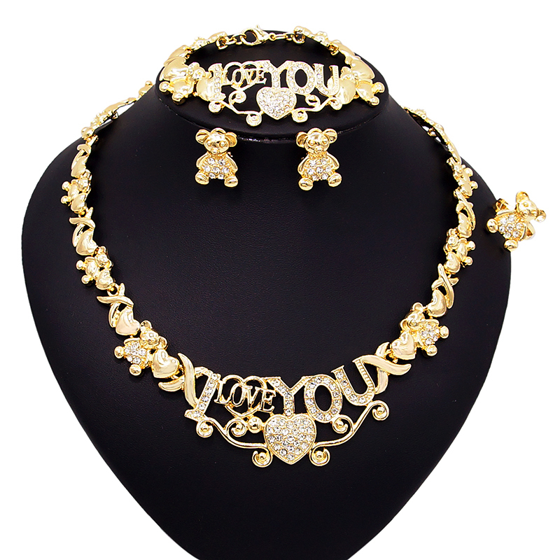 XOXO Women's 4-Piece Jewelry Set - 18K Gold Plated Necklace, Earrings, Bracelet, Ring, Rhinestone Bridal Set