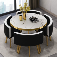 Ensemble de table à manger ronde moderne, luxueuse, durable, imperméable et écologique avec chaises en métal pour une utilisation en extérieur dans les hôtels, 1 table et 4 chaises