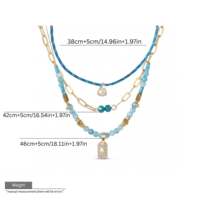 Collier multi-couches personnalisé EDGE avec perles bleues, pendentif éclair doré, bijoux élégants et tendance, collier OEM ODM pour femmes