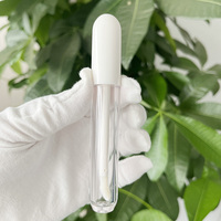 Nouveau Design vide rond blanc clair brillant à lèvres bouteille emballage en plastique brillant à lèvres Tube conteneur avec baguette