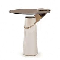 Table d'appoint raffinée Foshan pour la maison, table basse en cuir pour villa, table ronde en verre pour hôtel et café