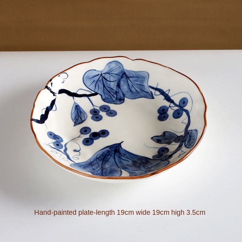 white round dish (round vine full of grapes)