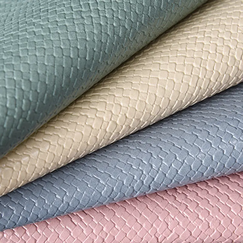 Telas de tapicería de cuero sintético de diseño al por mayor pequeño patrón de tejido PU cuero artificial utilizado para ropa, bolsos, zapatos