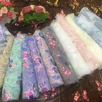 Prix de gros dentelle maille sequin tissu de broderie à la main papillon sequin tissu pour femmes vêtements